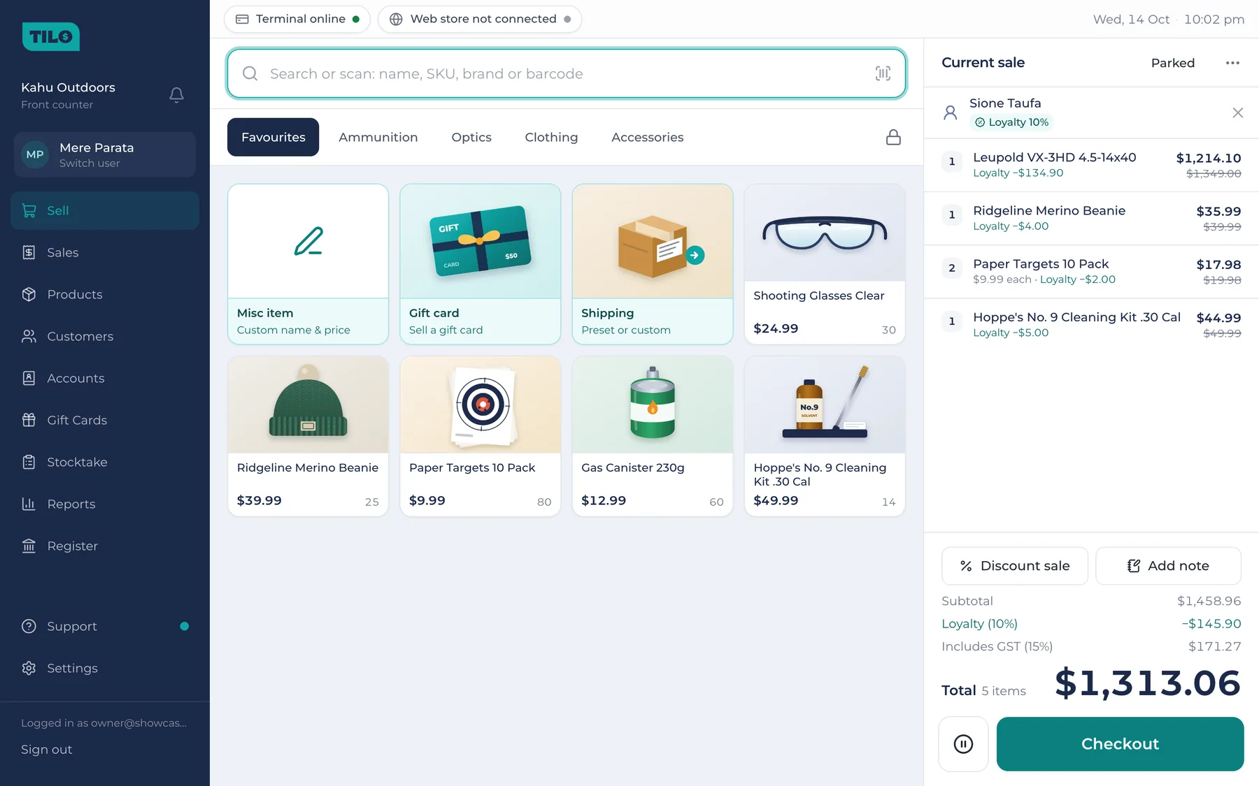 The Sell screen in Tilo: Favourites tiles with pictures, and a sale with a loyalty discount on each line, GST and the total.